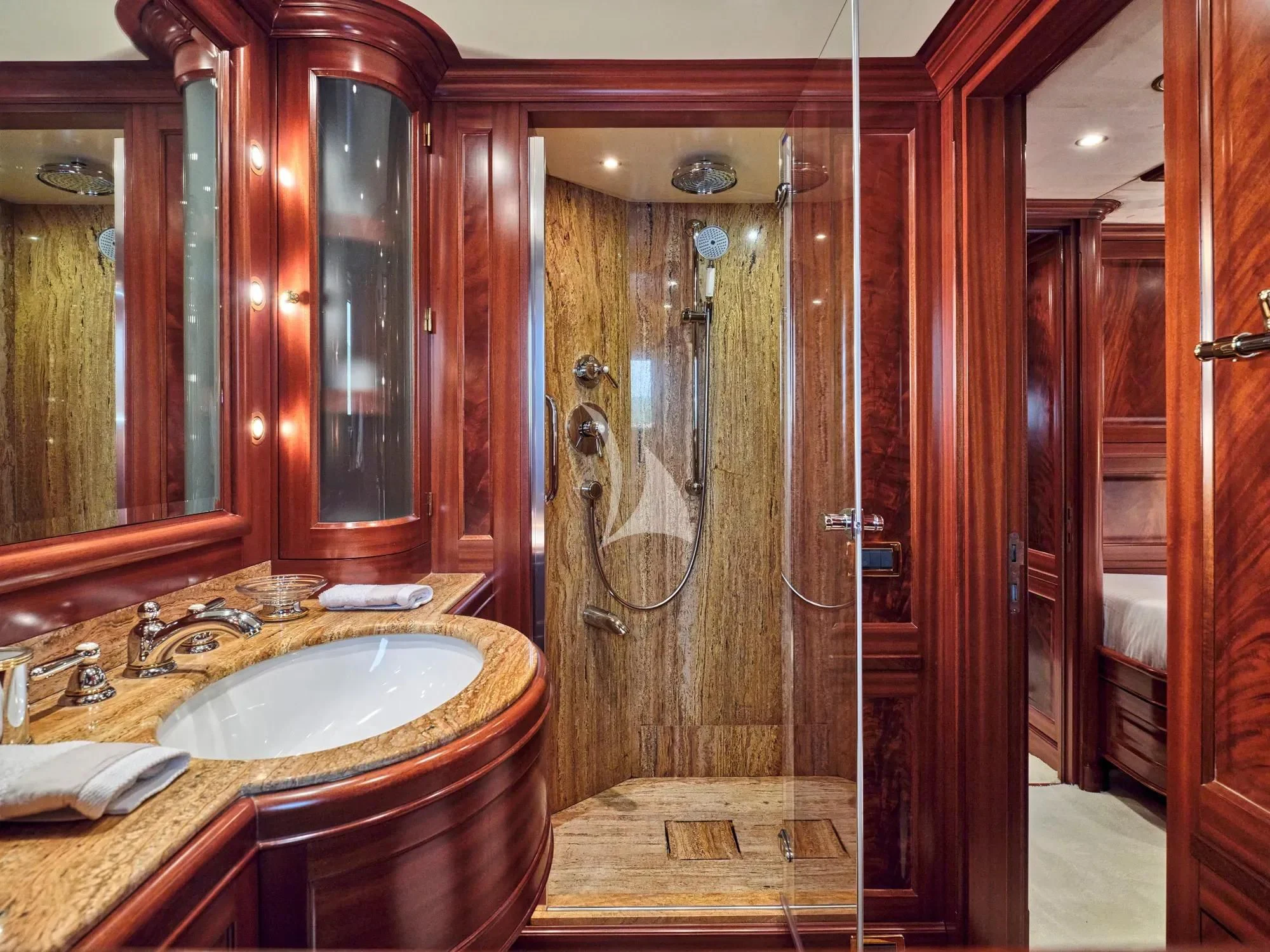 a bathroom with a sink and shower aboard OPTION B Yacht for Charter