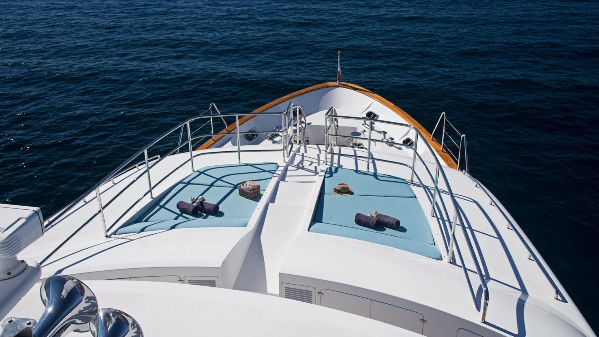 a white boat in the water aboard OPTION B Yacht for Charter