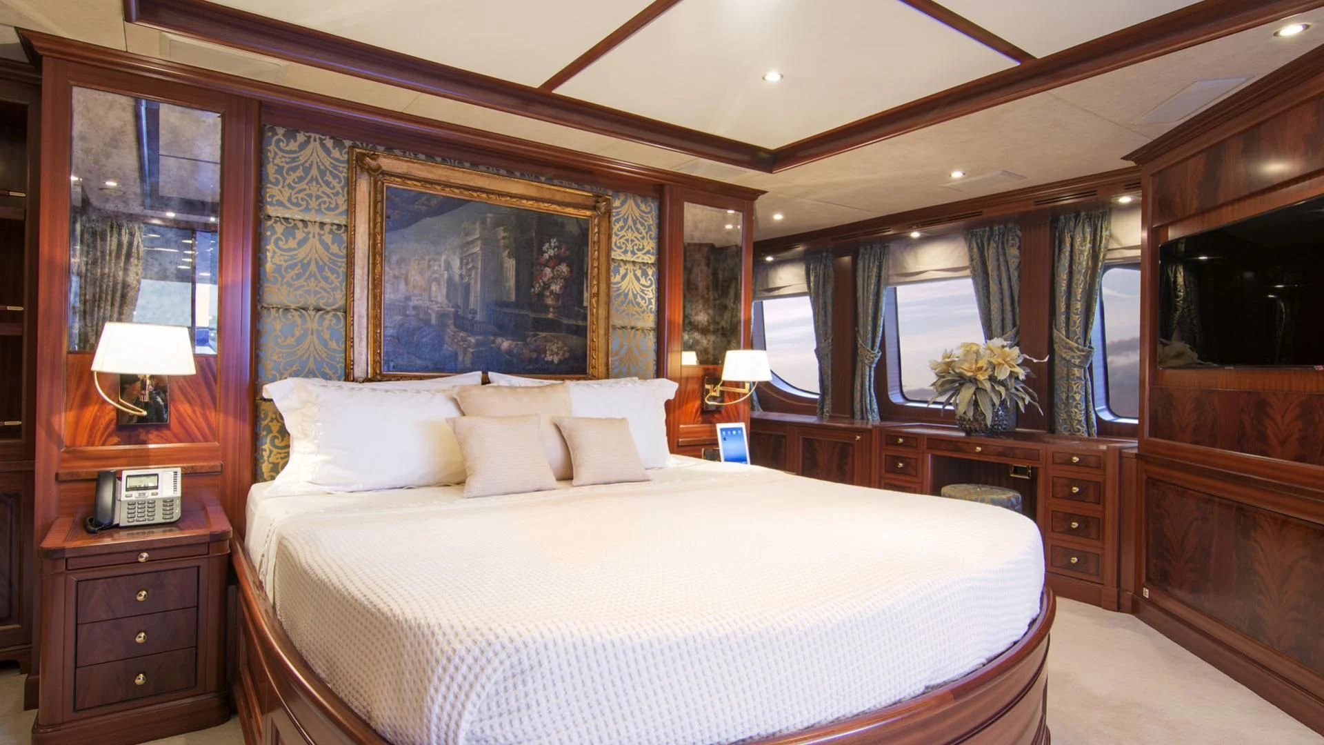 a large bed in a room aboard OPTION B Yacht for Charter