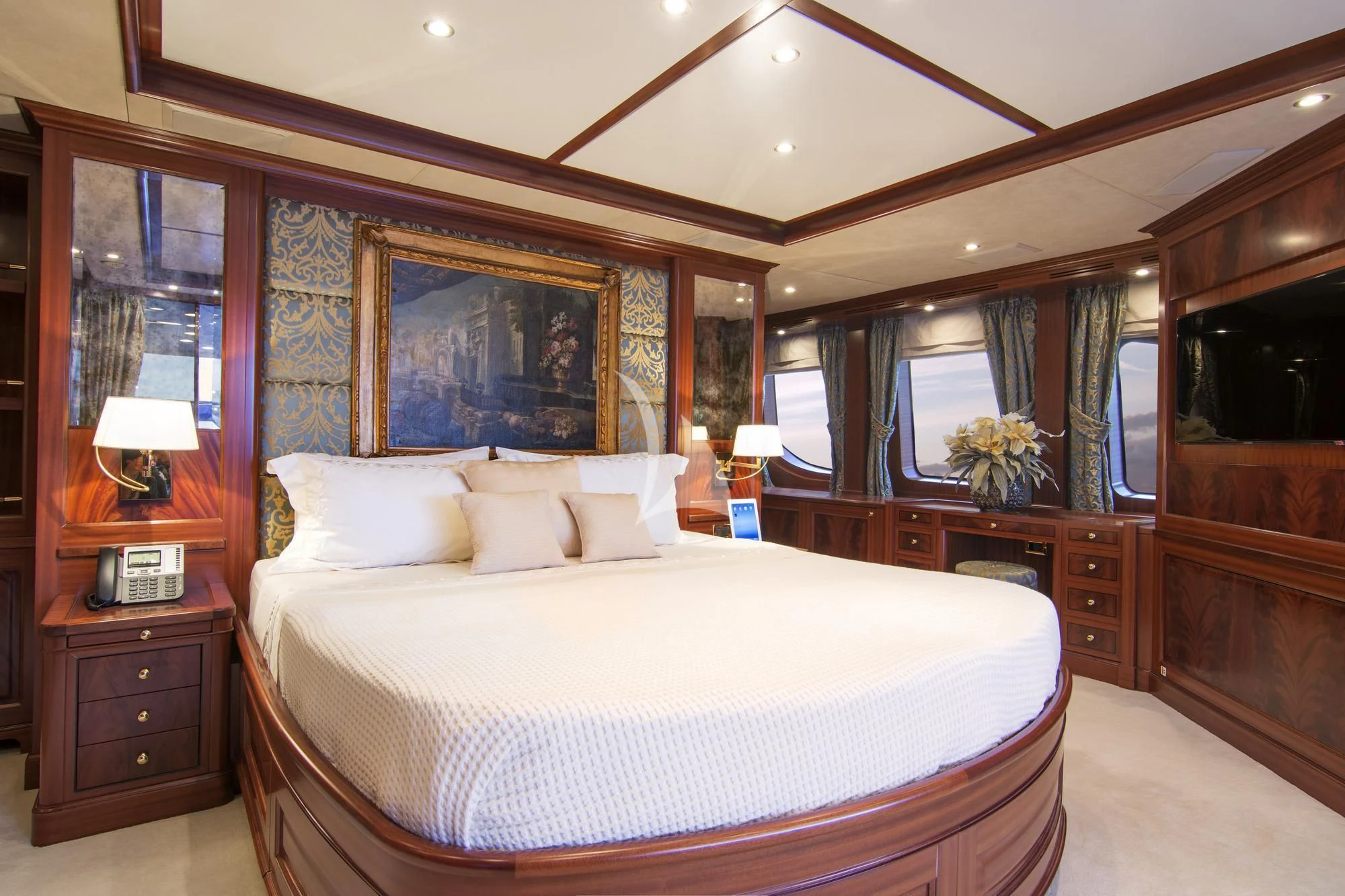 a large bed in a room aboard OPTION B Yacht for Charter