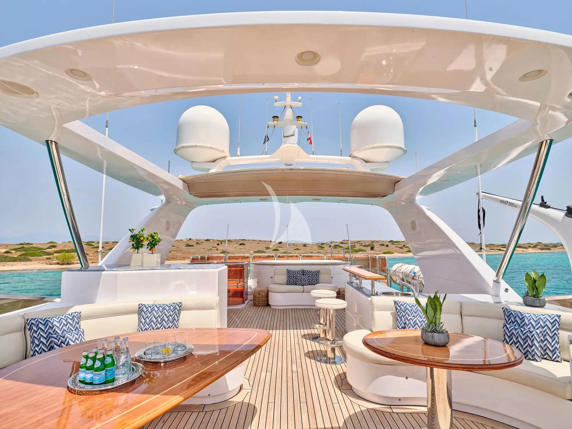 a room with a table and chairs aboard OPTION B Yacht for Charter