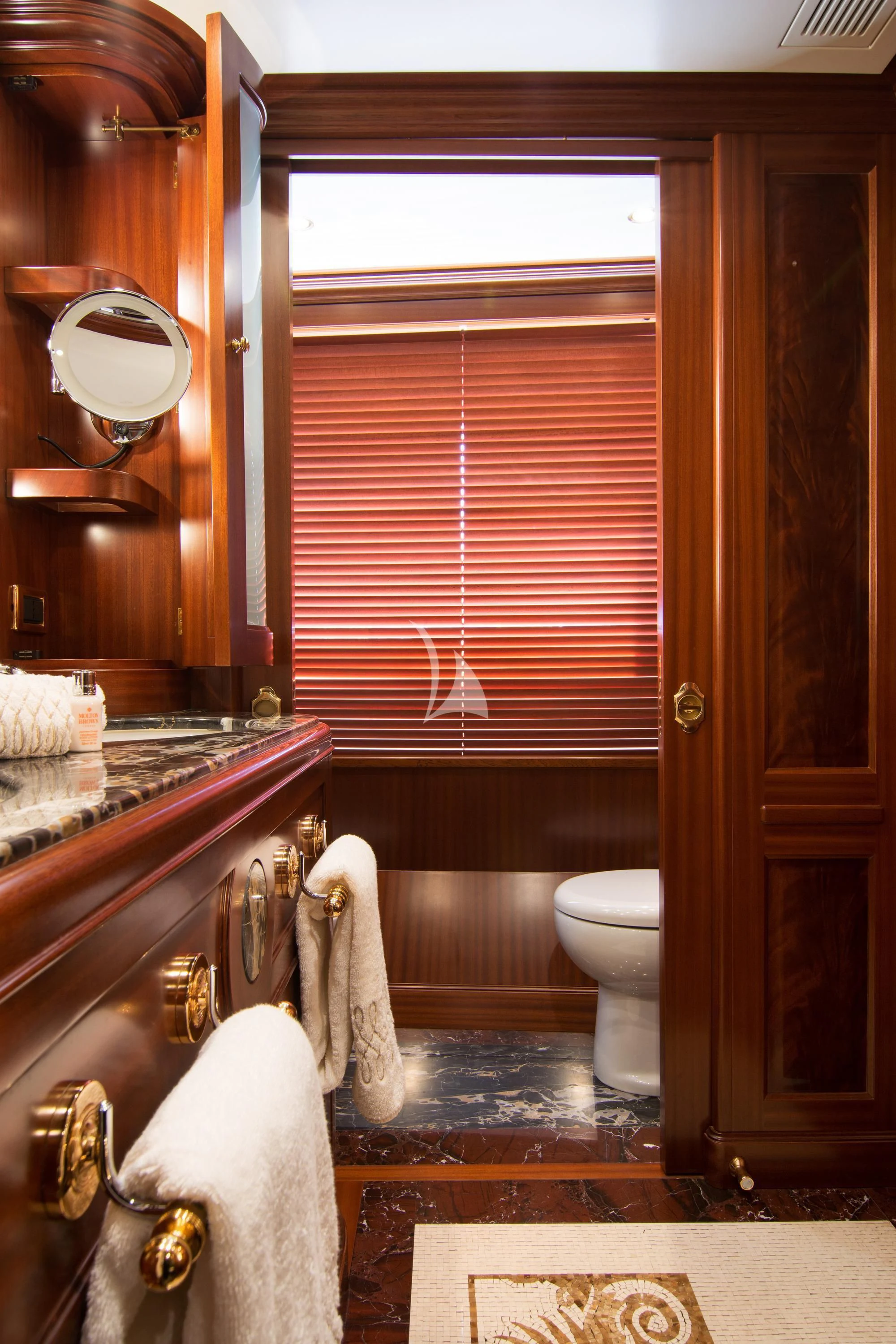 a bathroom with a large window aboard OPTION B Yacht for Charter