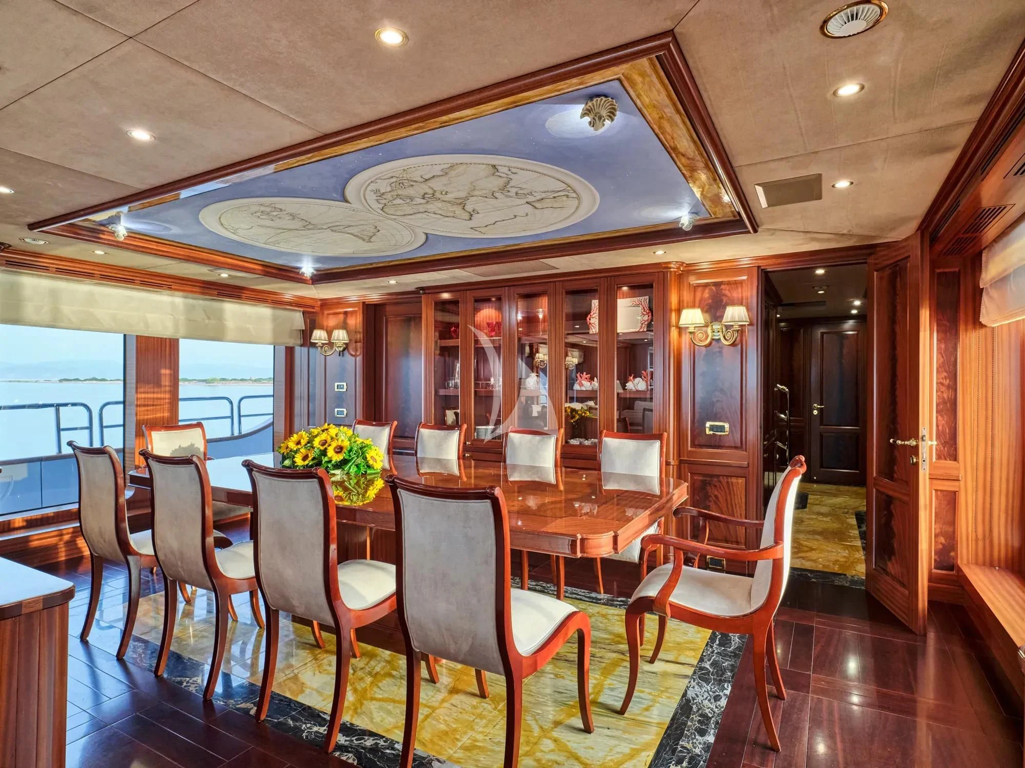 a restaurant with tables and chairs aboard OPTION B Yacht for Charter