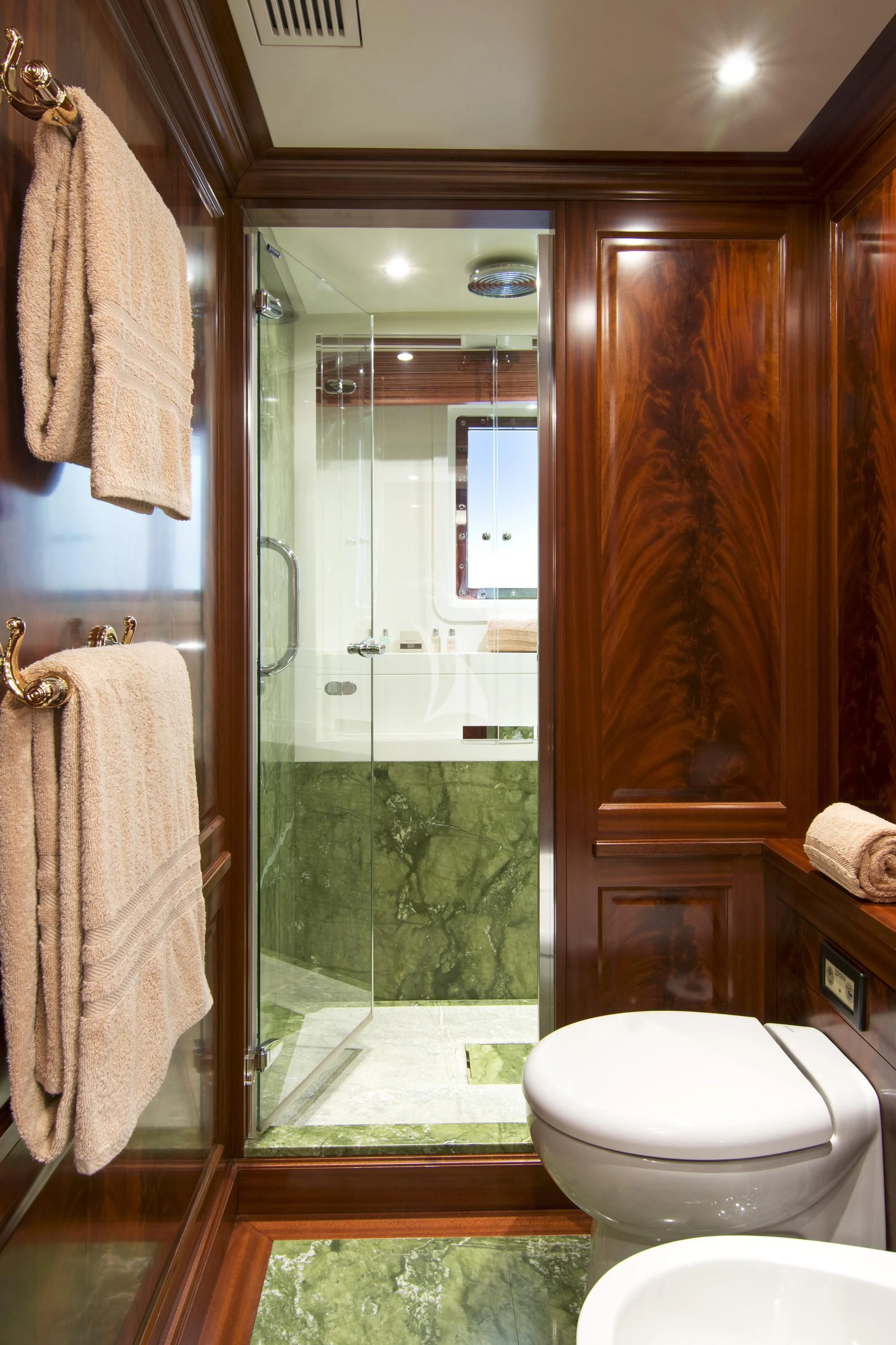 a bathroom with a glass shower aboard OPTION B Yacht for Charter