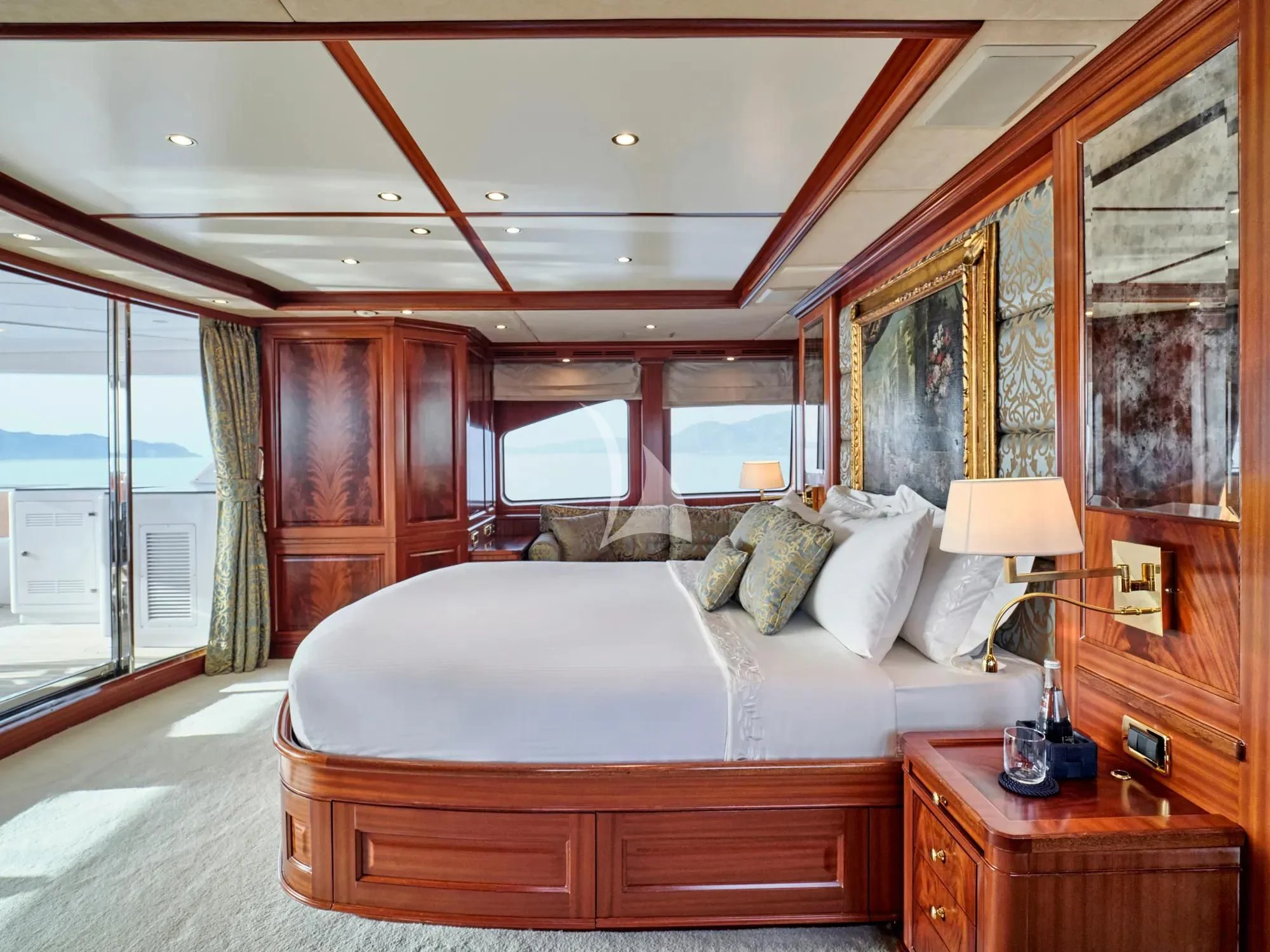 a large bed in a room aboard OPTION B Yacht for Charter