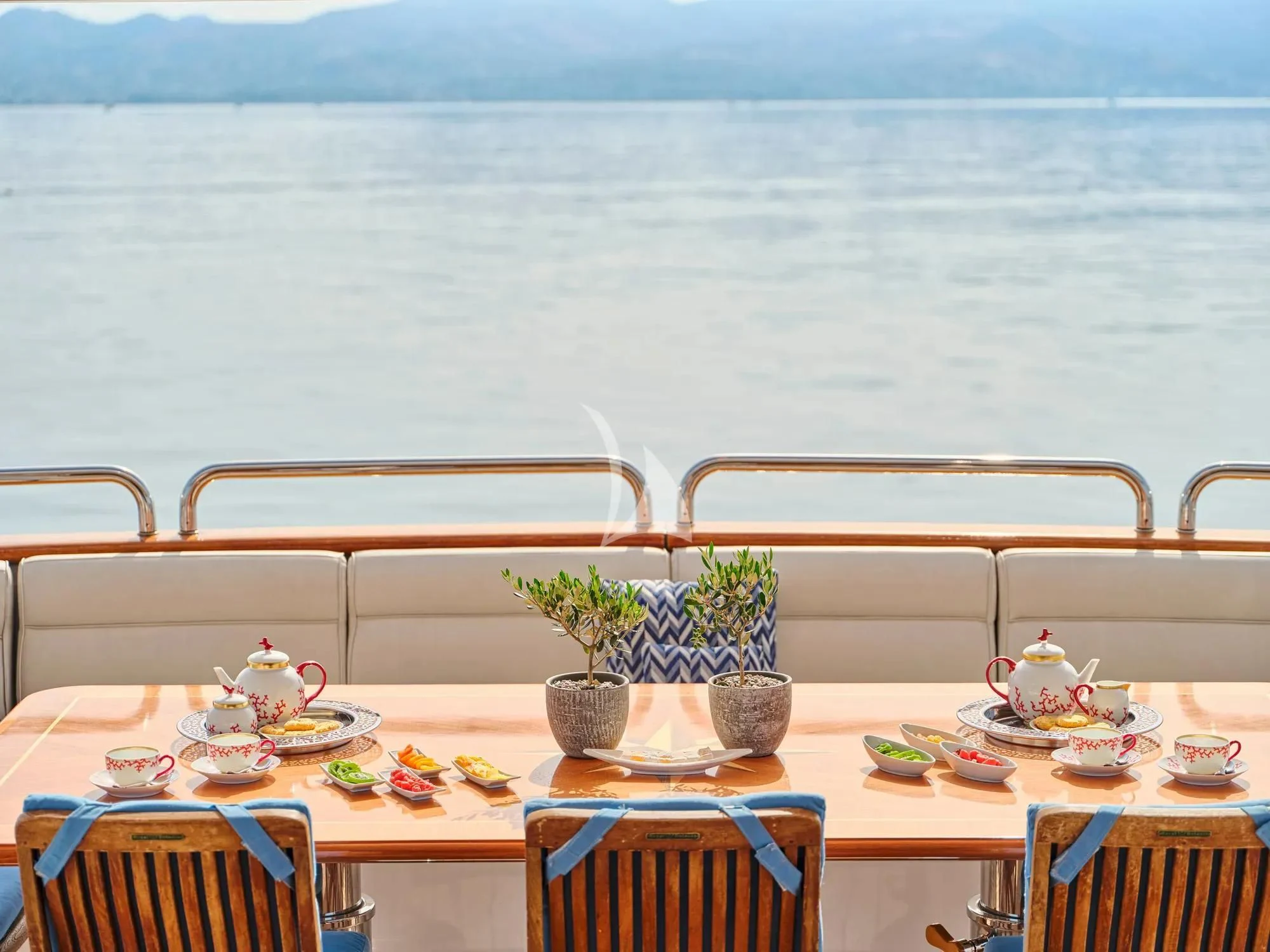 a table with food on it aboard OPTION B Yacht for Charter