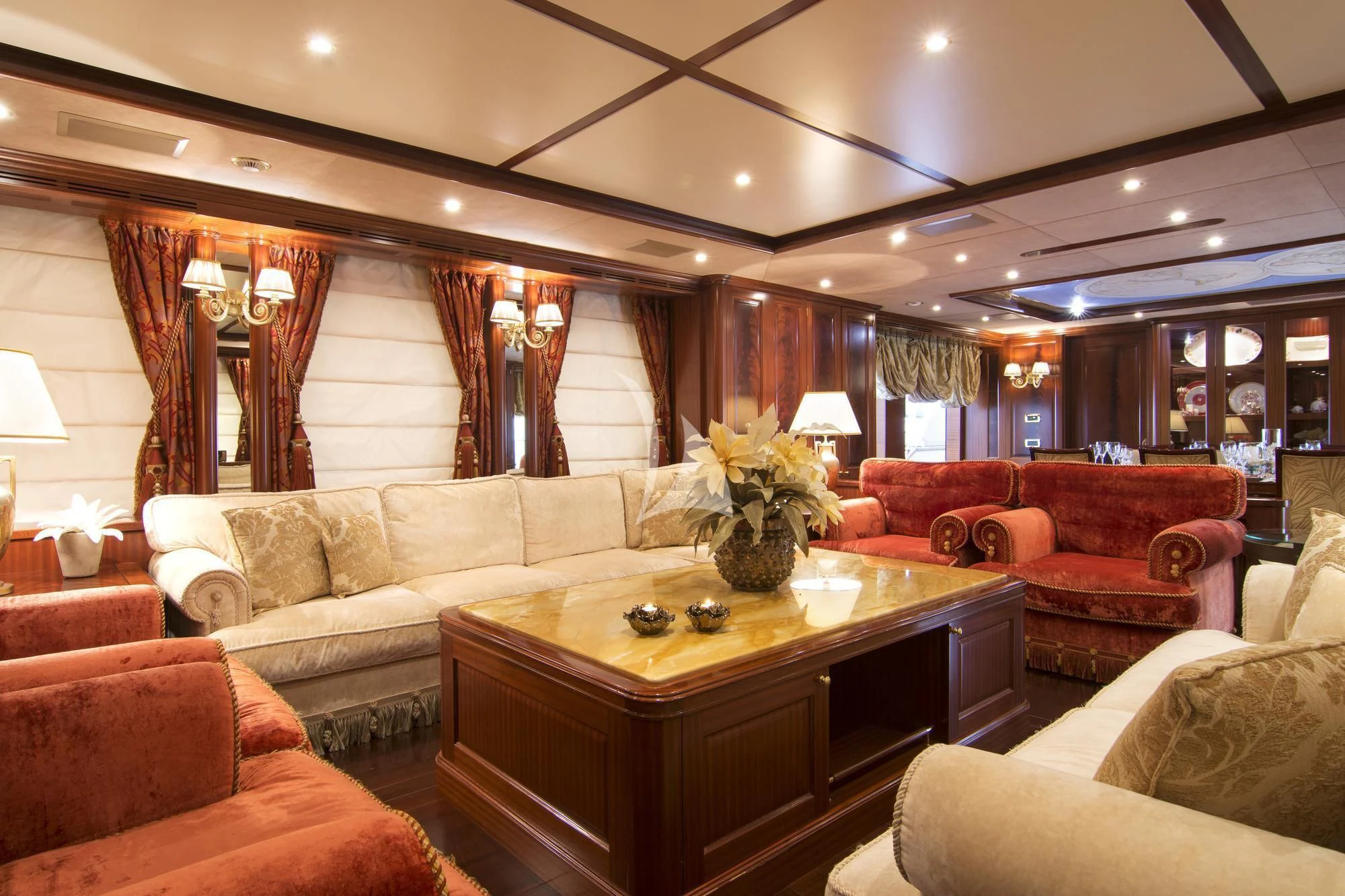 a living room with a large window aboard OPTION B Yacht for Charter