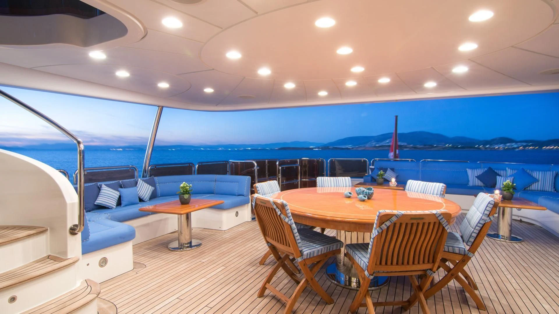 a large room with tables and chairs aboard OPTION B Yacht for Charter
