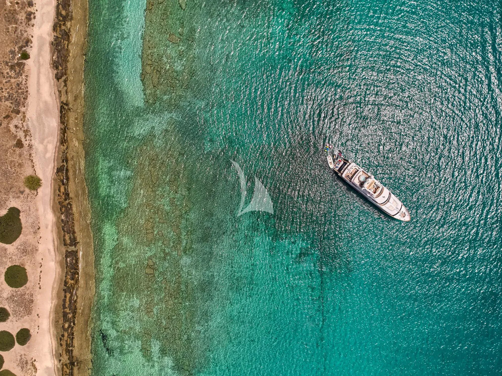 a key on a blue surface aboard OPTION B Yacht for Charter