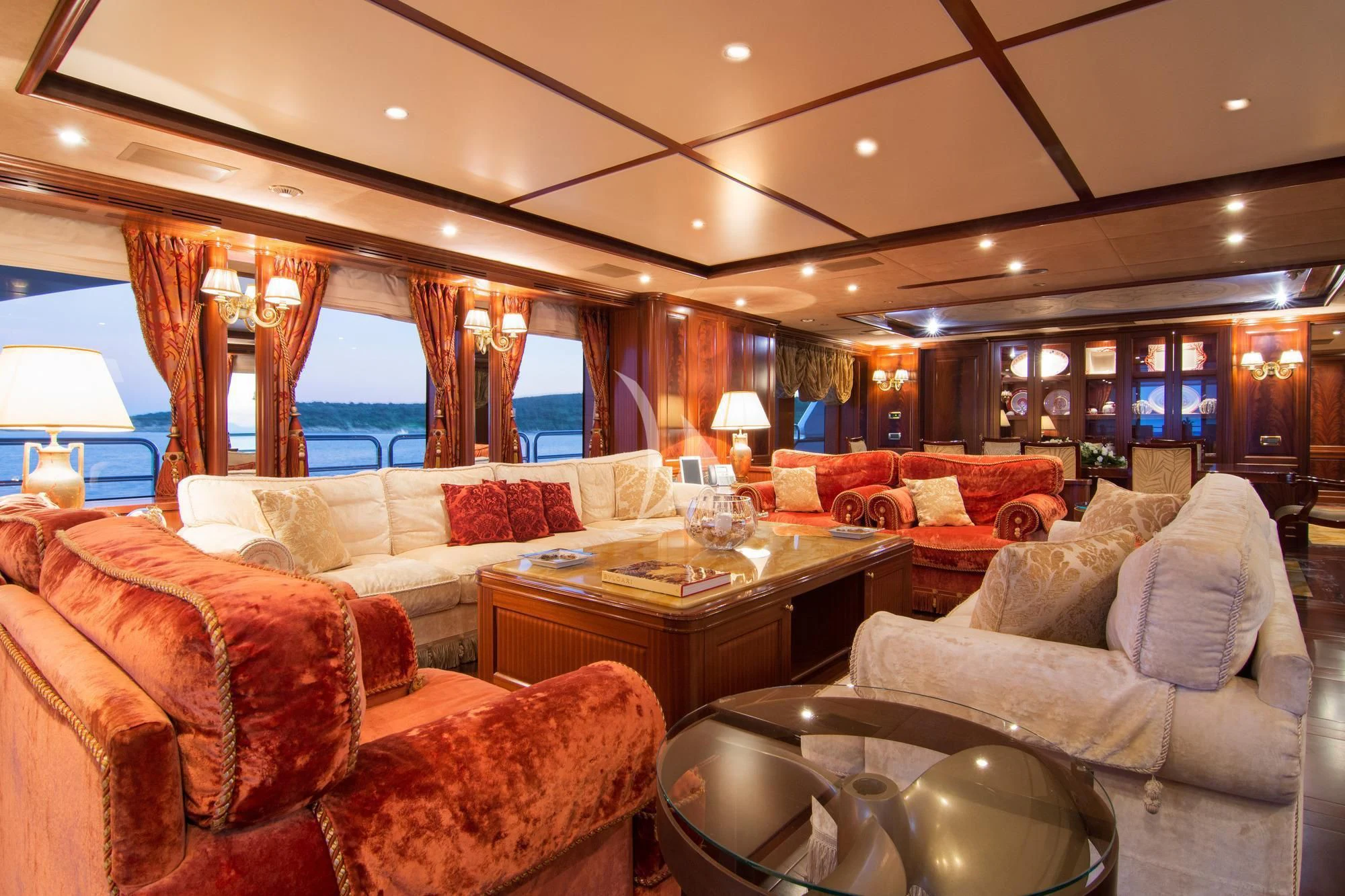 a living room with a large window aboard OPTION B Yacht for Charter
