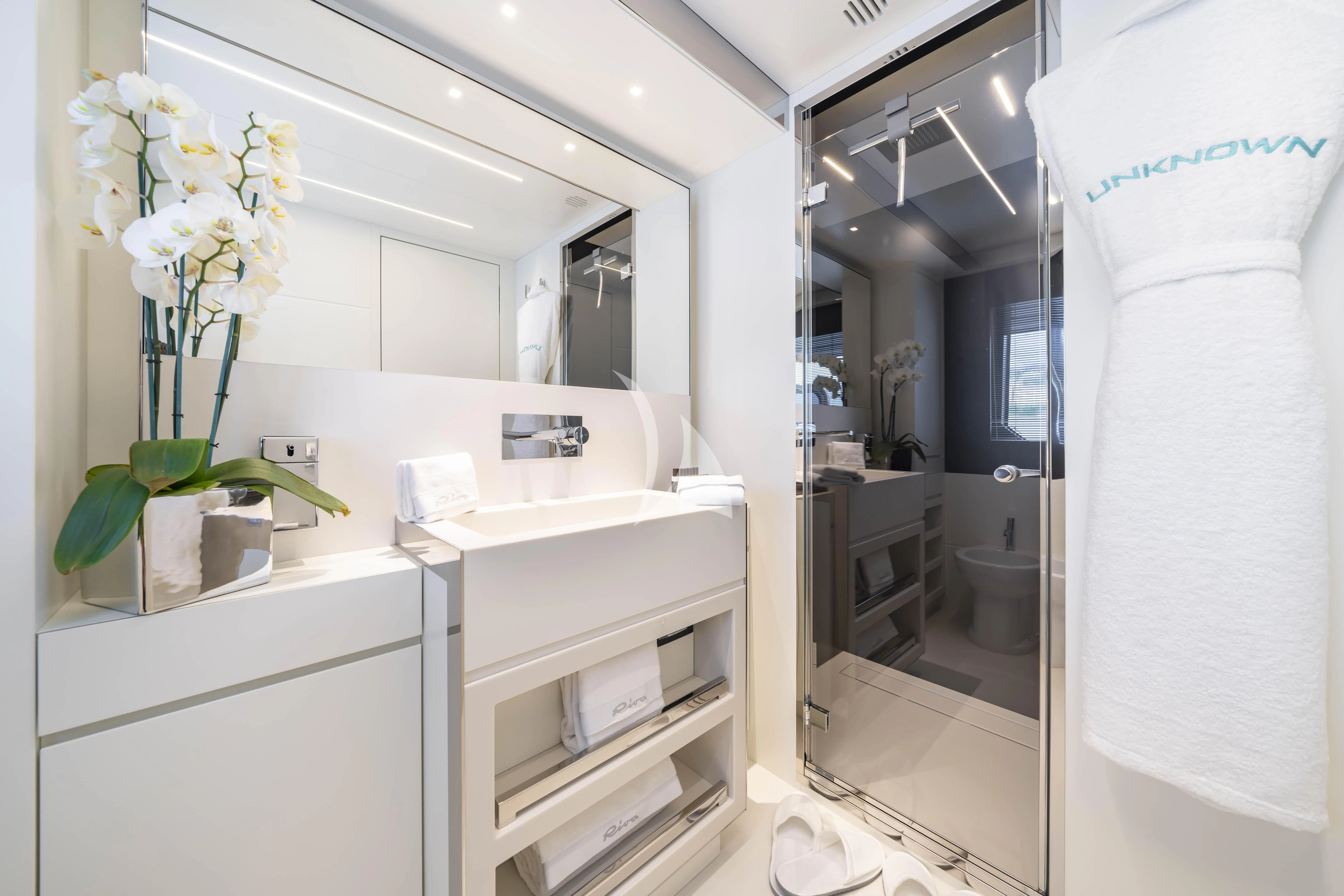 a bathroom with a sink and toilet aboard HP6 Yacht for Charter