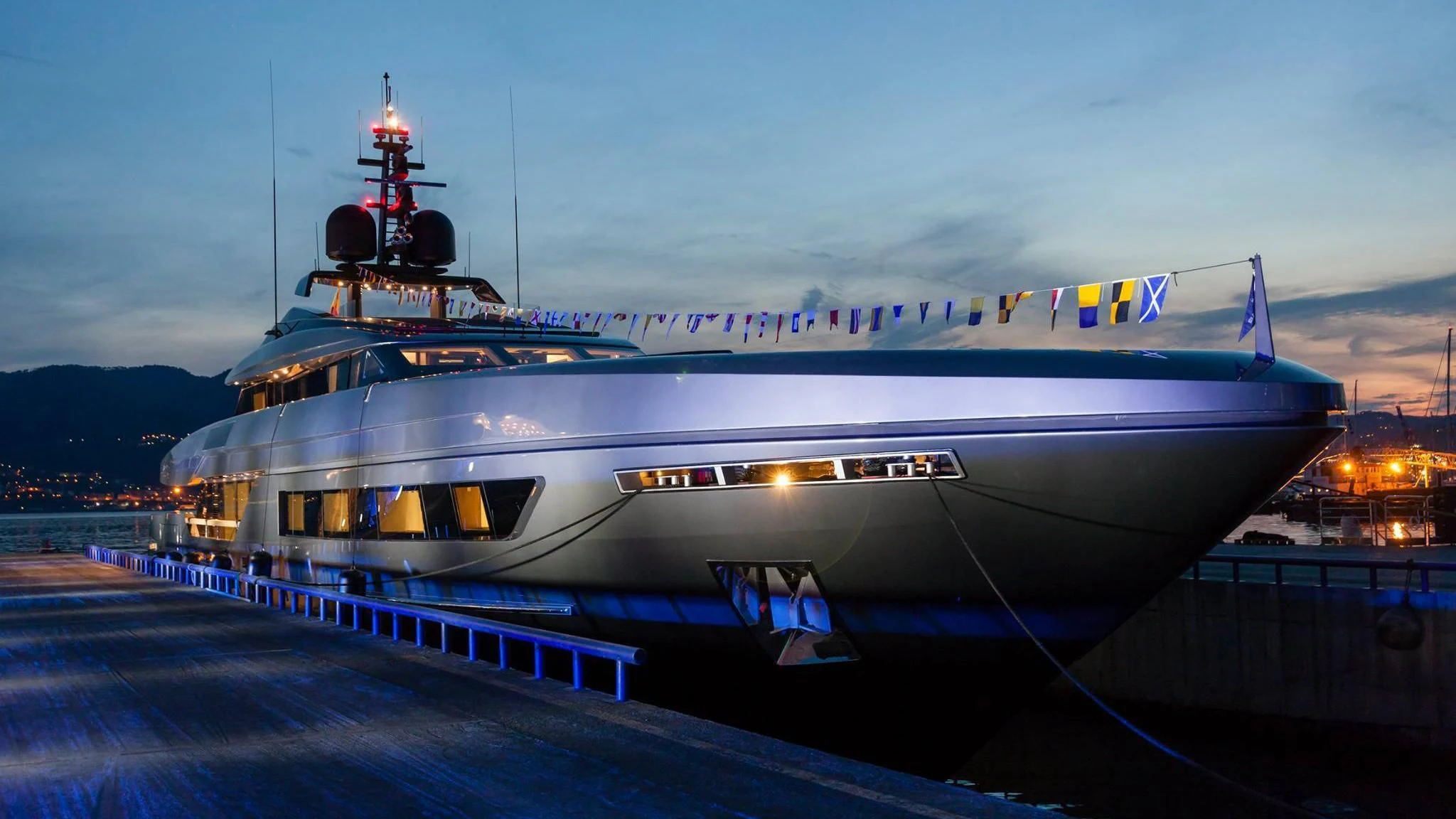 a large ship docked at a pier aboard SIMPLY EIGHT Yacht for Sale