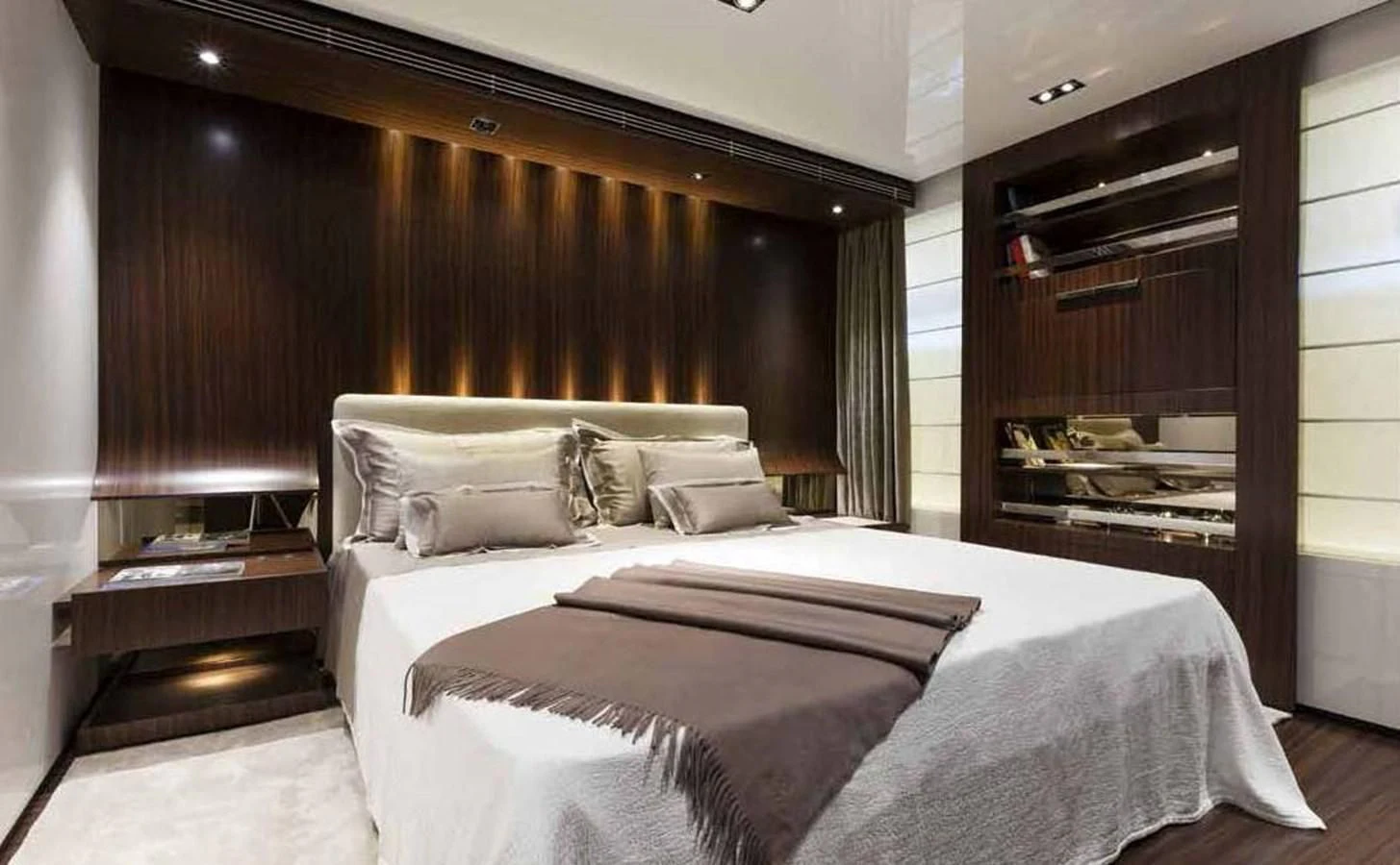 a bed with a white sheet aboard SIMPLY EIGHT Yacht for Sale