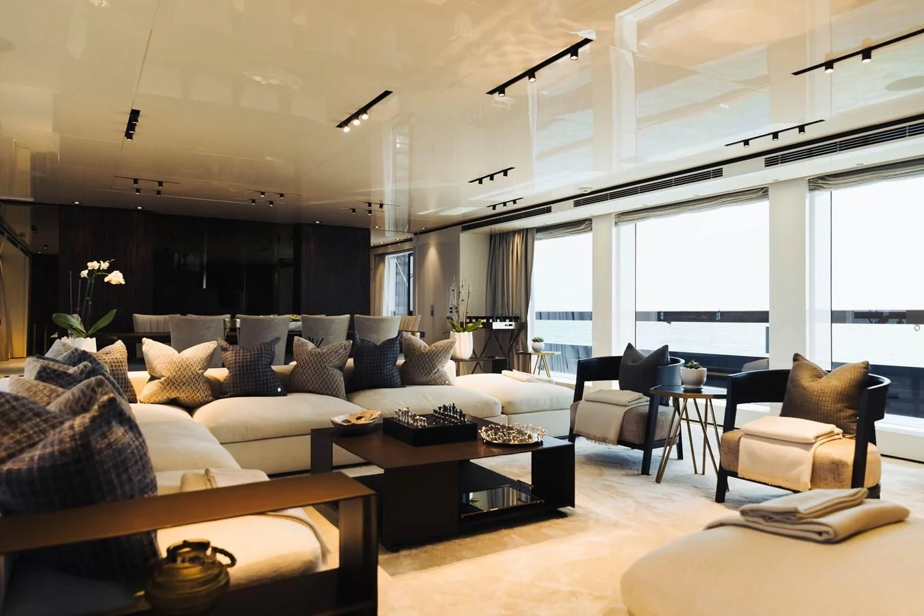 a living room with a couch and a coffee table aboard SIMPLY EIGHT Yacht for Sale