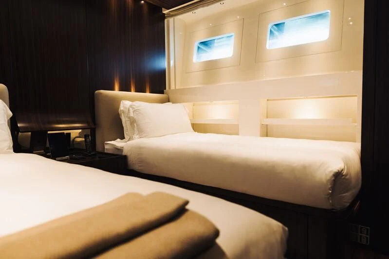 a room with two beds aboard SIMPLY EIGHT Yacht for Sale