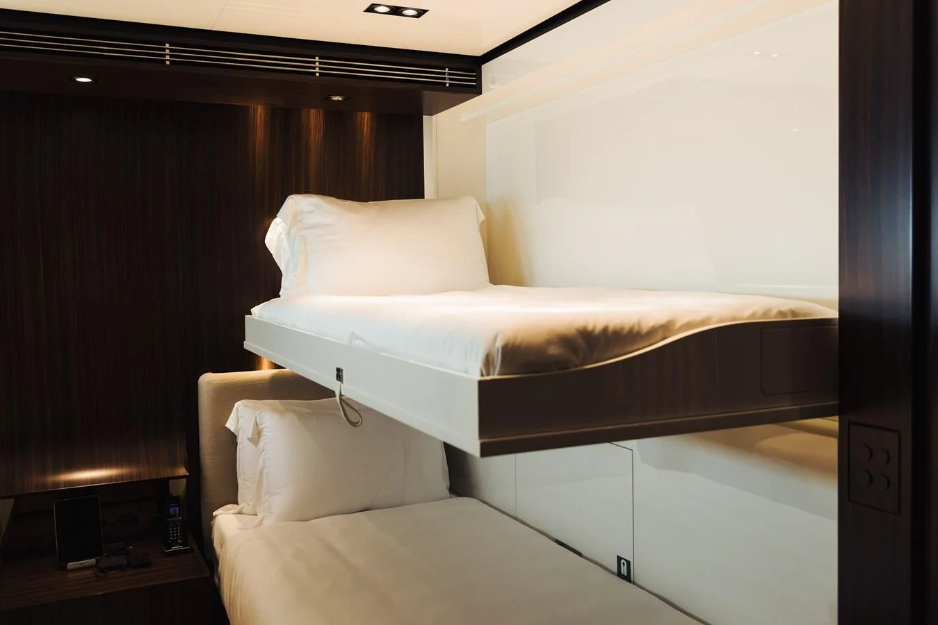 a bed with white sheets aboard SIMPLY EIGHT Yacht for Sale