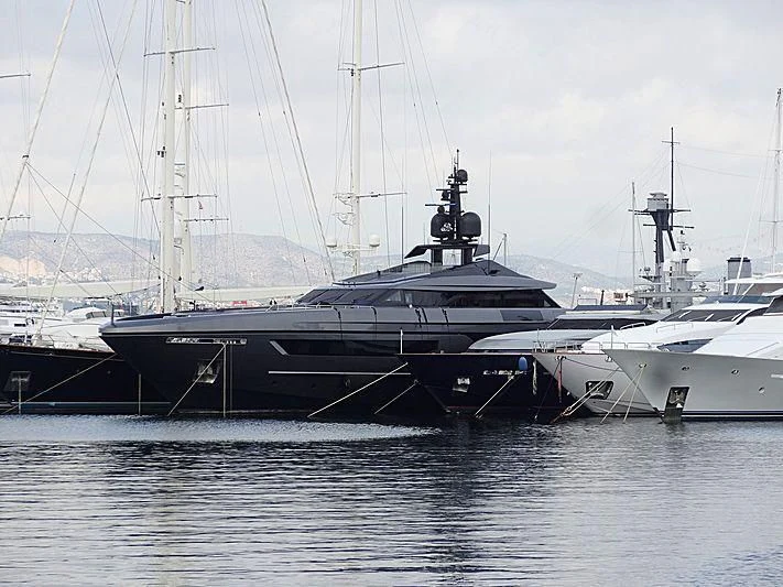 a large boat docked at a pier aboard SIMPLY EIGHT Yacht for Sale