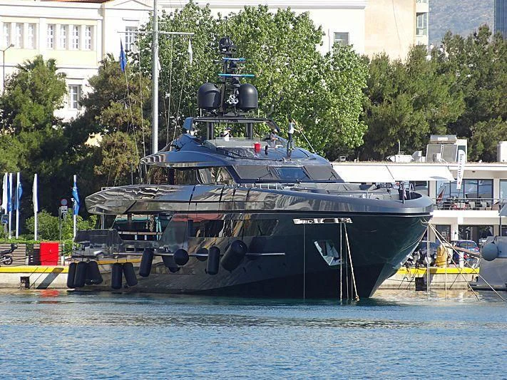 a large boat in a harbor aboard SIMPLY EIGHT Yacht for Sale