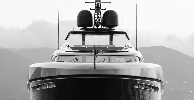 a black and white photo of a car with a large antenna on top aboard SIMPLY EIGHT Yacht for Sale