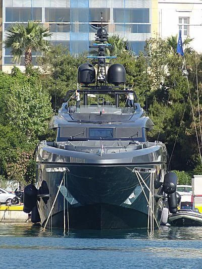 a large military ship in the water aboard SIMPLY EIGHT Yacht for Sale