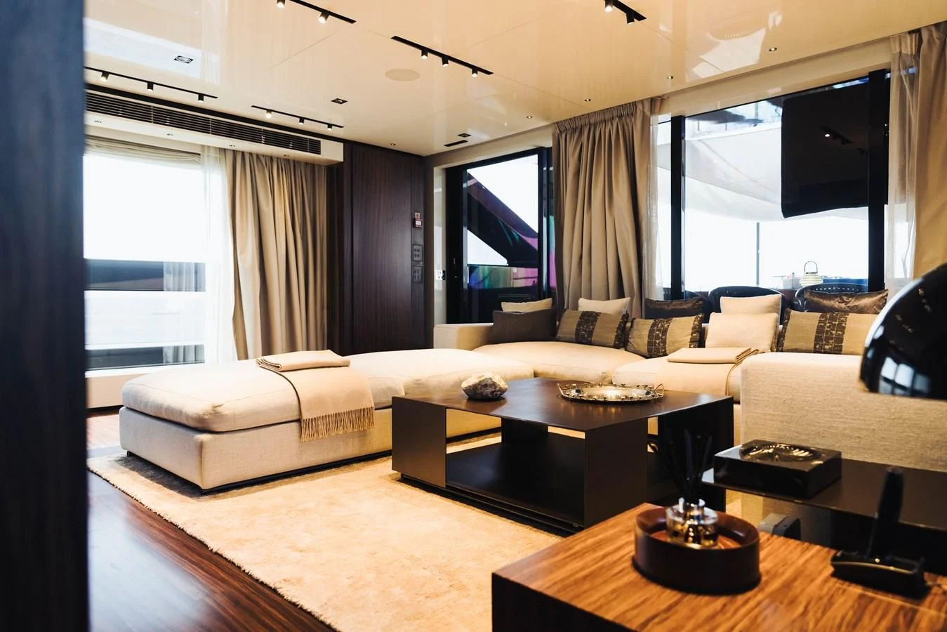 a living room with a large window aboard SIMPLY EIGHT Yacht for Sale