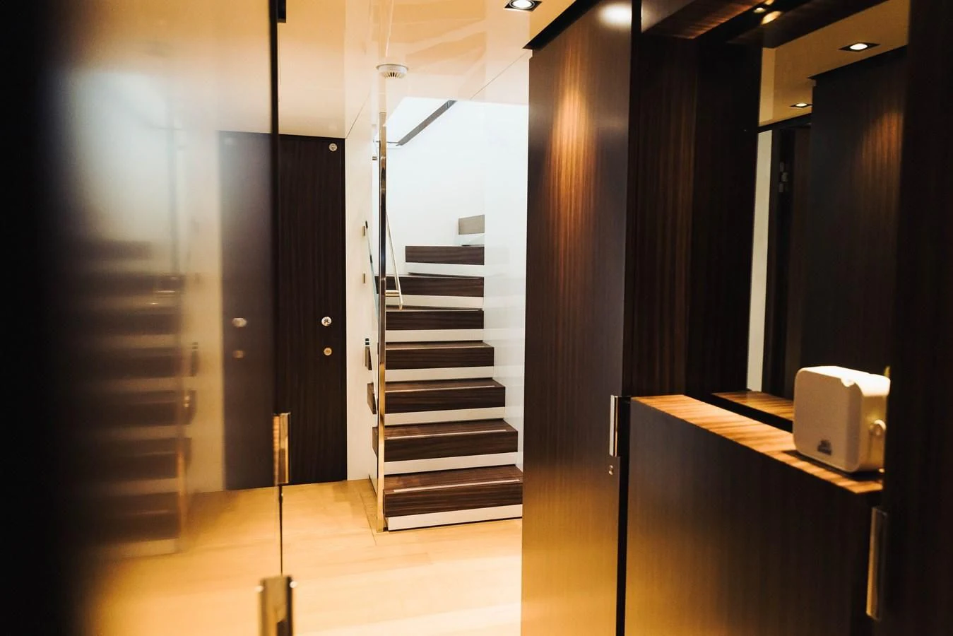 a room with a staircase and a white box aboard SIMPLY EIGHT Yacht for Sale