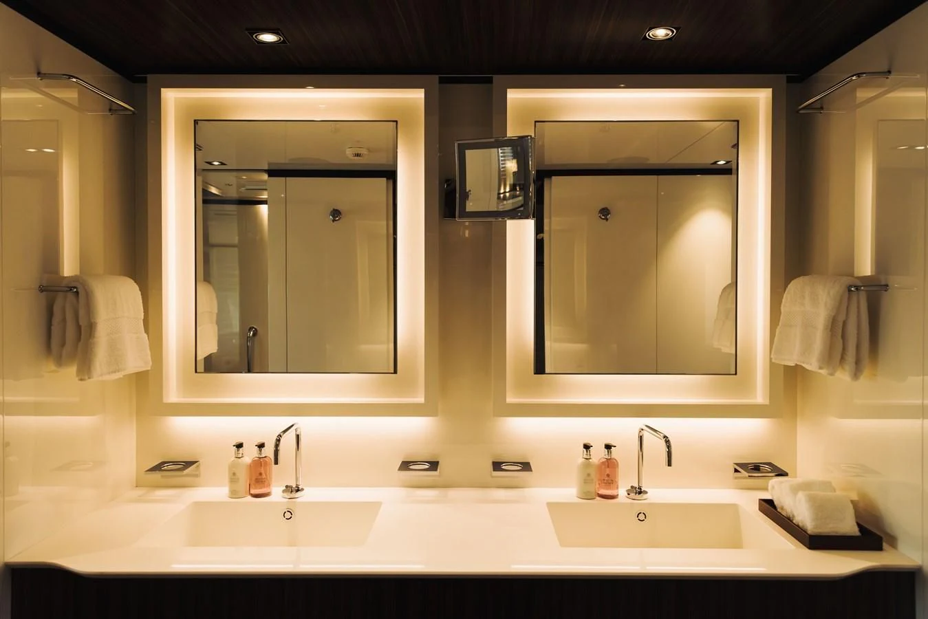 a bathroom with two mirrors aboard SIMPLY EIGHT Yacht for Sale
