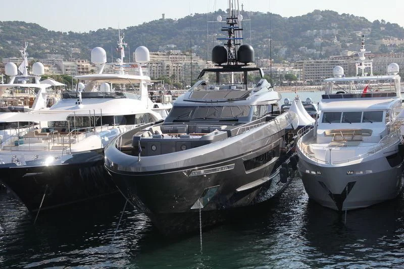 a group of boats are parked in a harbor aboard SIMPLY EIGHT Yacht for Sale