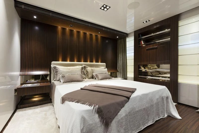 a bed with a white sheet aboard SIMPLY EIGHT Yacht for Sale