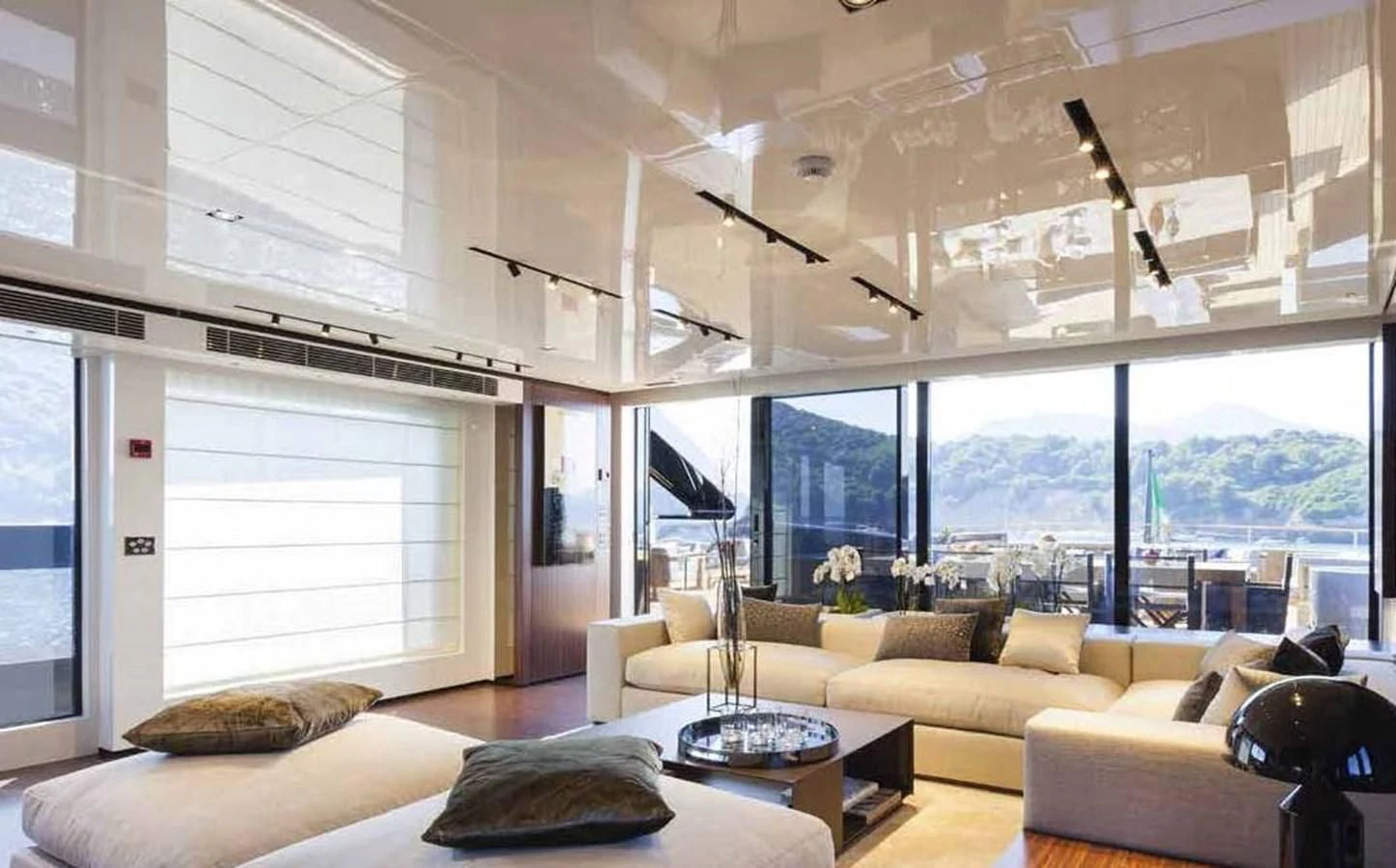 a living room with a large window aboard SIMPLY EIGHT Yacht for Sale