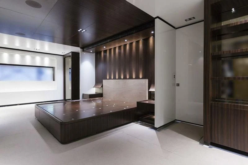 a room with a table and a tv aboard SIMPLY EIGHT Yacht for Sale