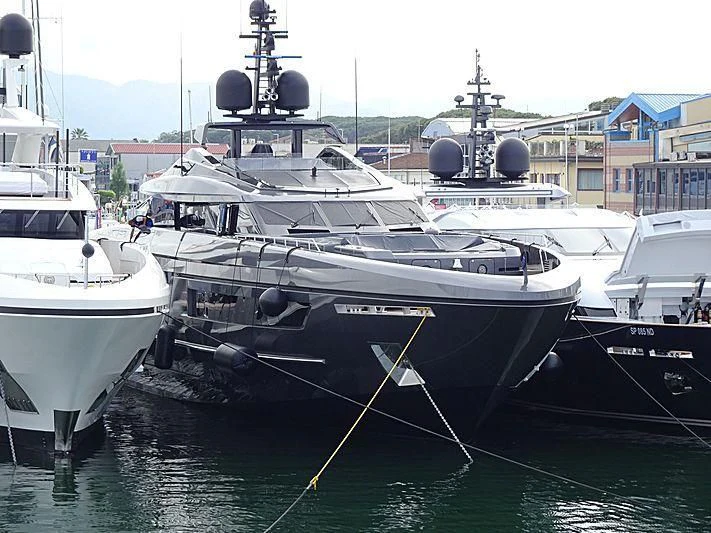 a group of boats are parked in a harbor aboard SIMPLY EIGHT Yacht for Sale