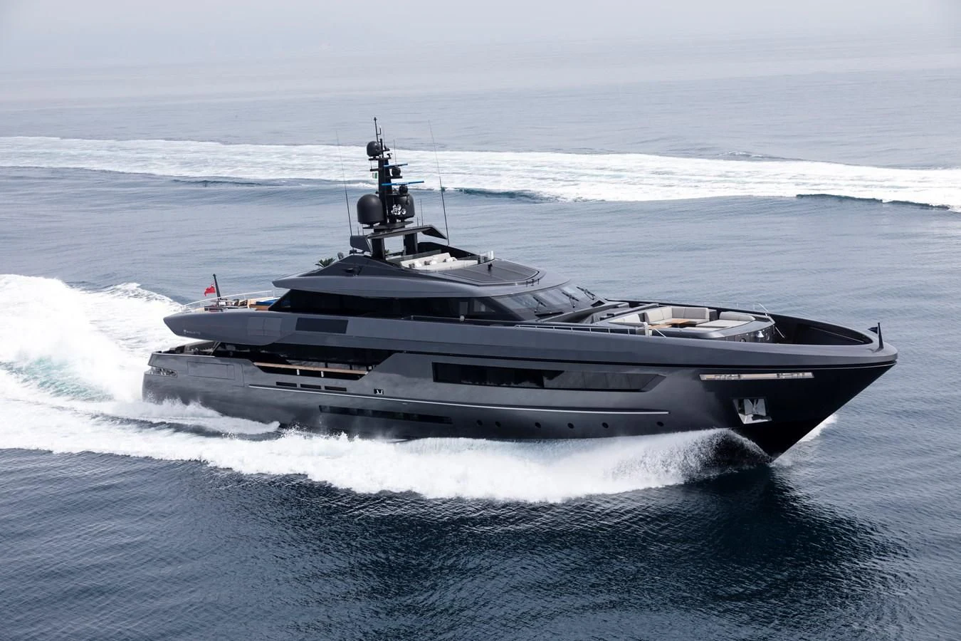 a military ship in the ocean aboard SIMPLY EIGHT Yacht for Sale
