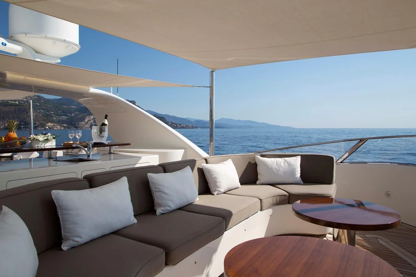 a large living room with a large body of water aboard MINA Yacht for Sale
