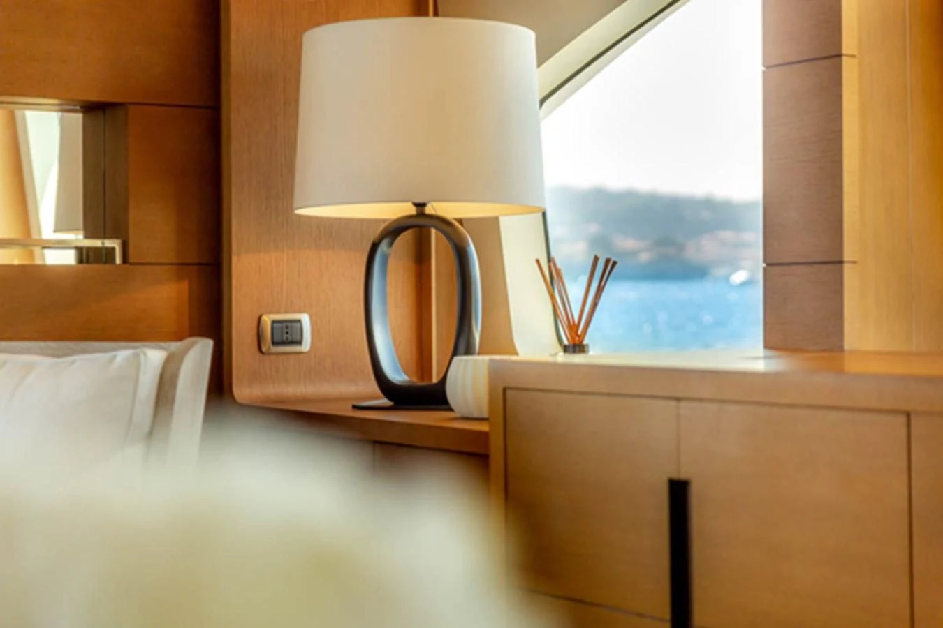 a lamp on a table aboard MINA Yacht for Sale