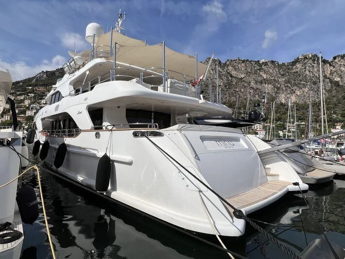 a boat docked at a pier aboard MINA Yacht for Sale