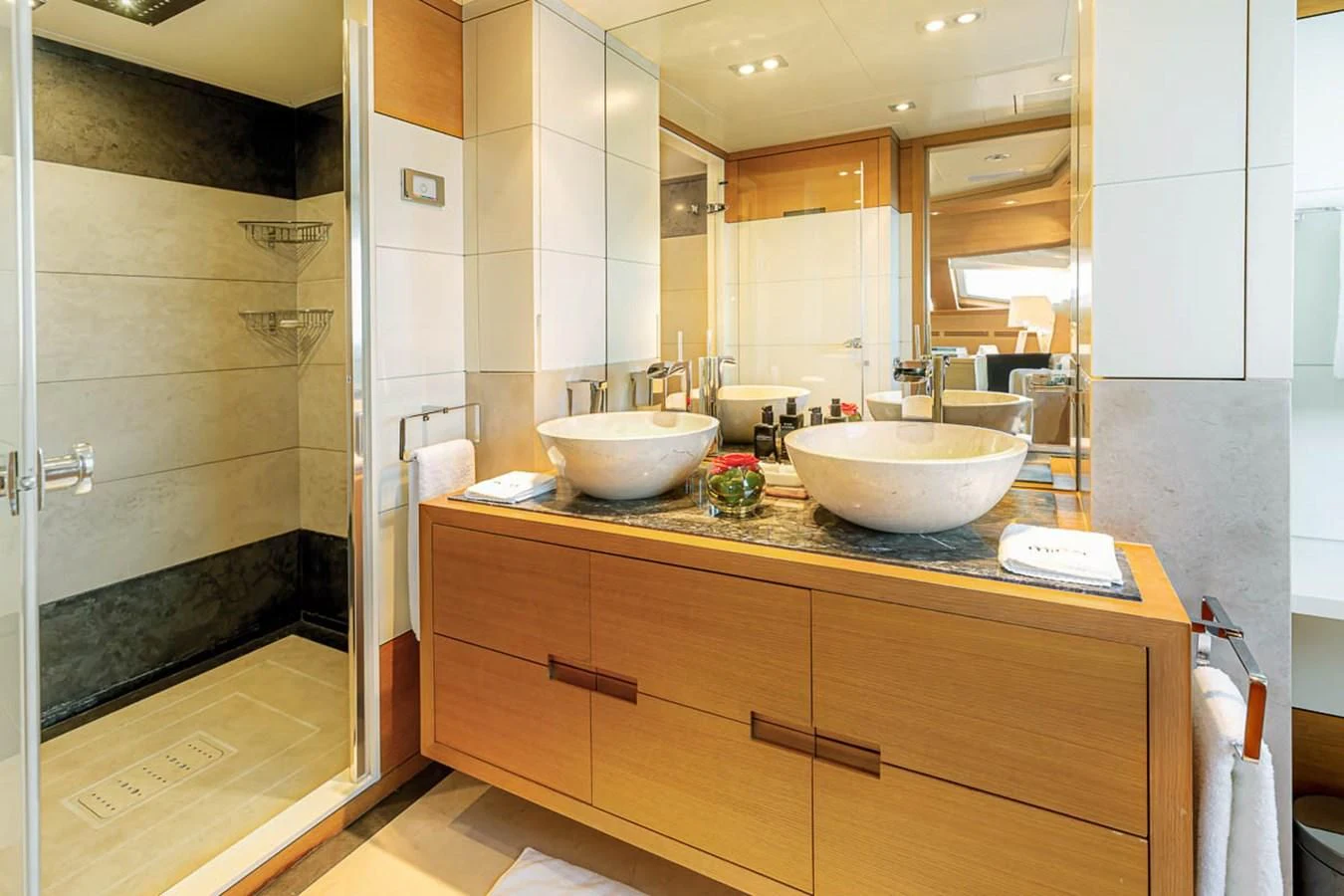 a bathroom with a sink and a mirror aboard MINA Yacht for Sale