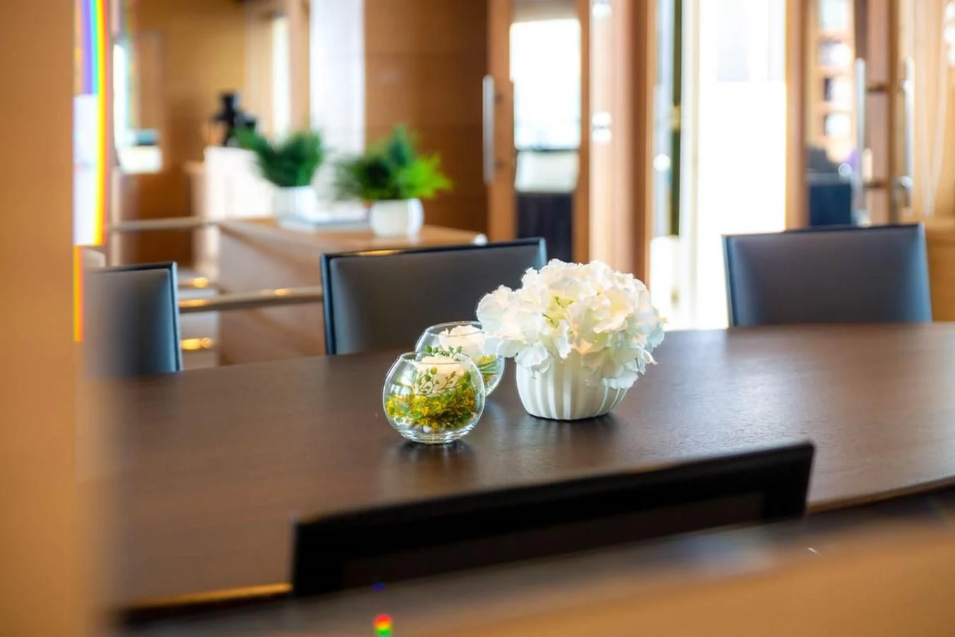 a table with a vase of flowers aboard MINA Yacht for Sale