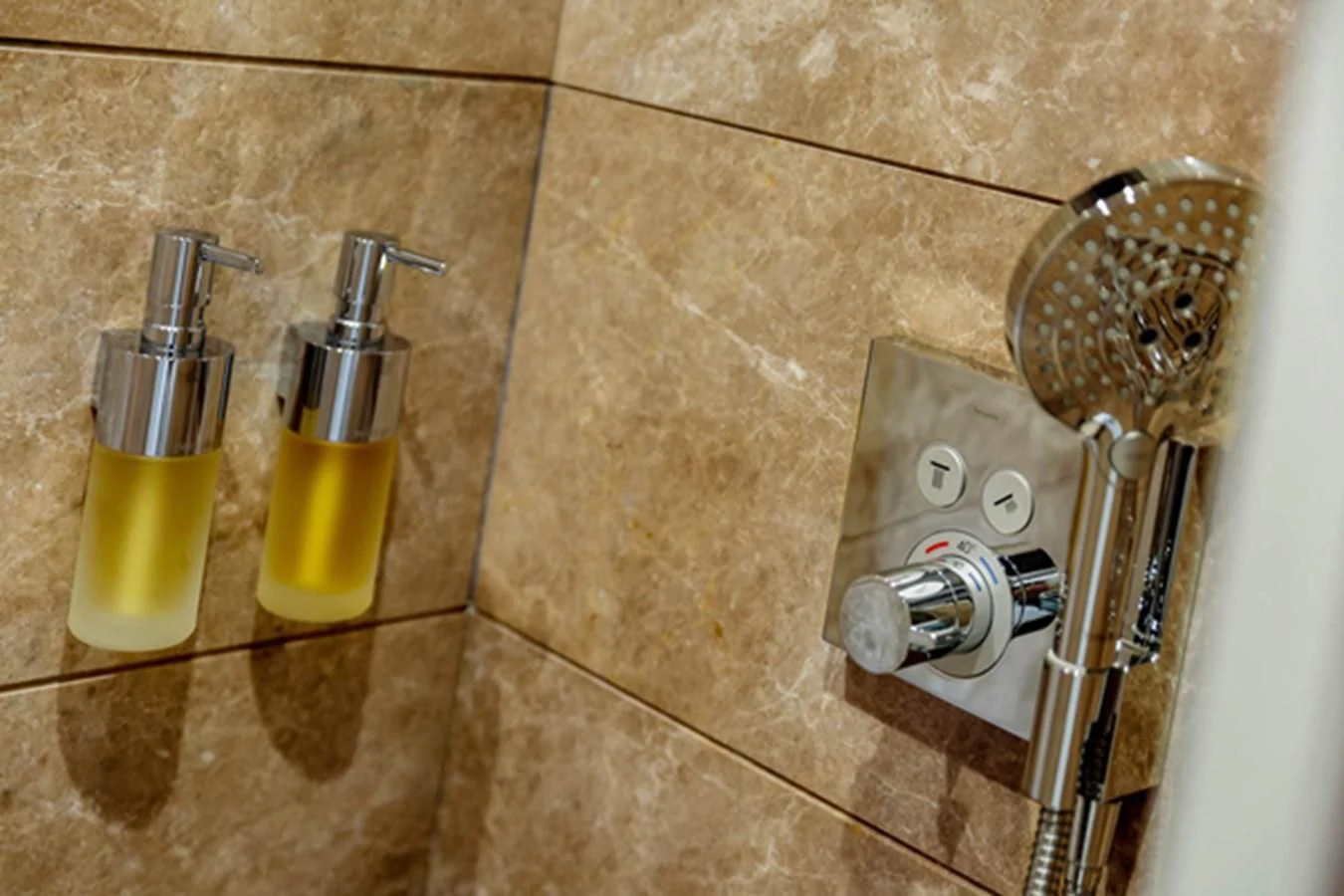 a bathroom with a faucet and a sink aboard MINA Yacht for Sale