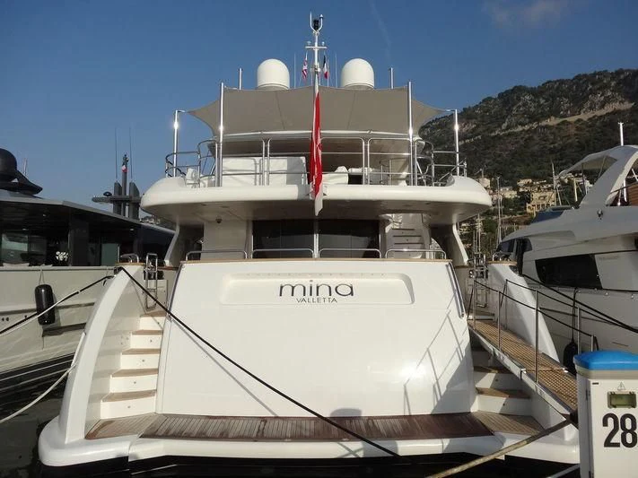 a boat docked at a pier aboard MINA Yacht for Sale