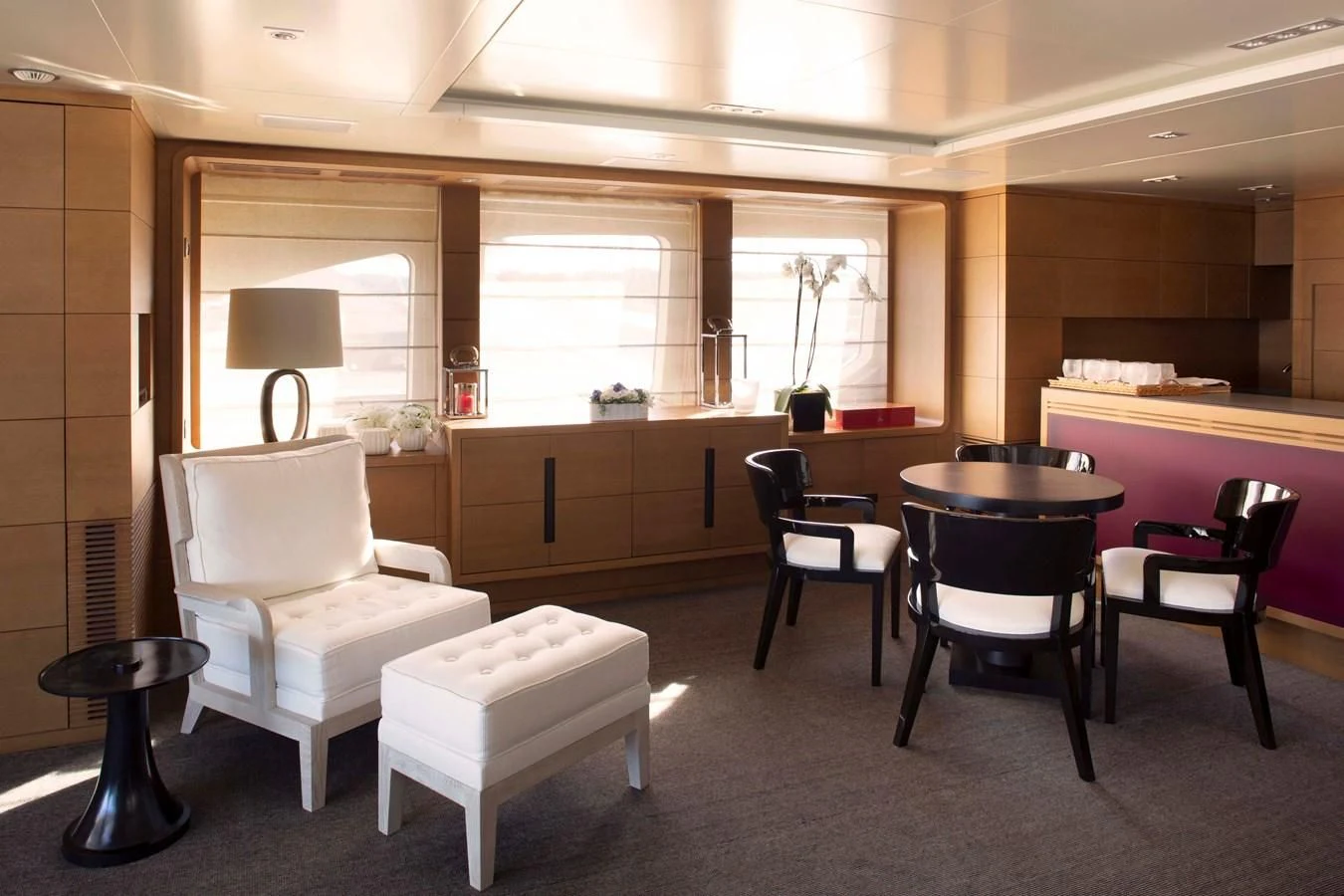 a room with chairs and tables aboard MINA Yacht for Sale