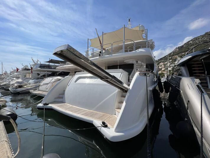a boat docked at a pier aboard MINA Yacht for Sale
