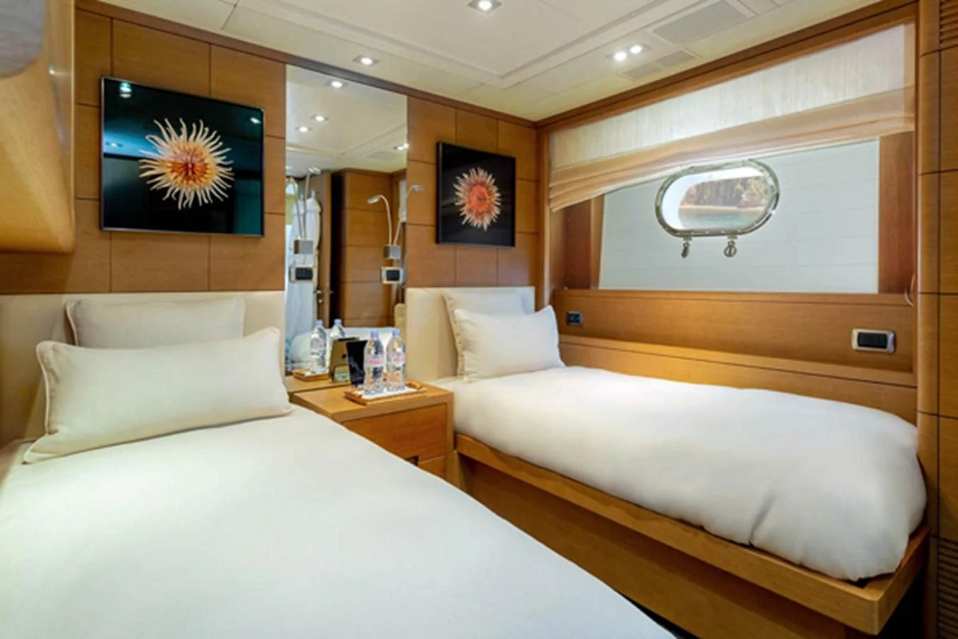 a room with two beds aboard MINA Yacht for Sale