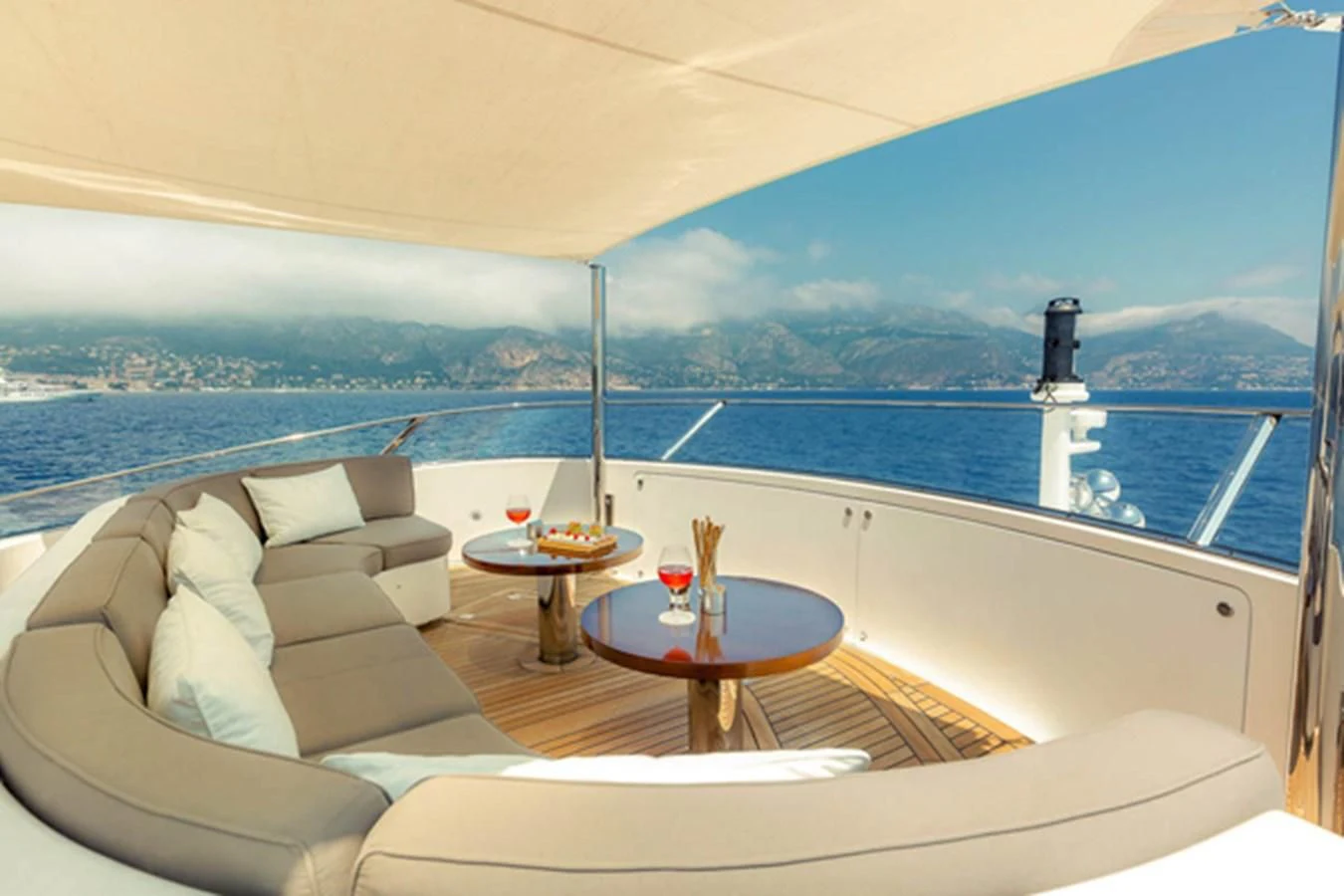a room with a couch and a table and a window aboard MINA Yacht for Sale