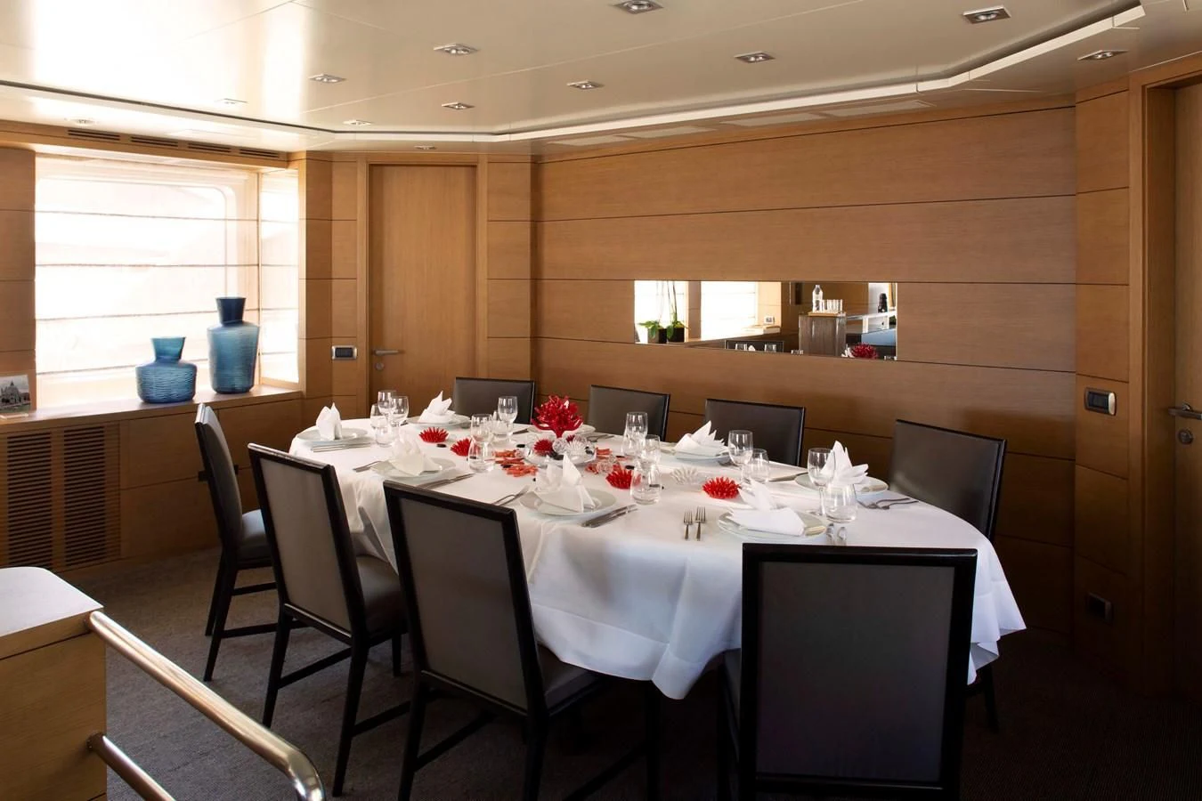 a table set for a dinner aboard MINA Yacht for Sale