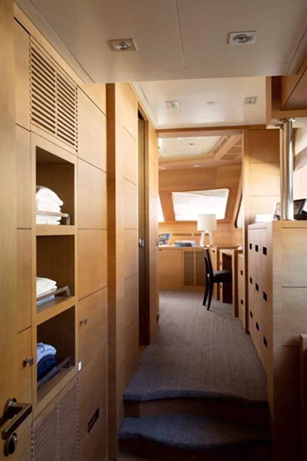 a room with a desk and a chair aboard MINA Yacht for Sale