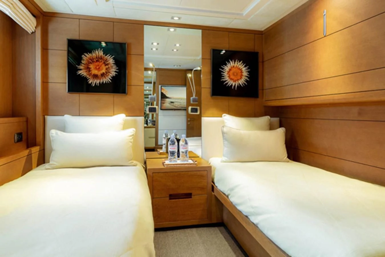 a room with two beds aboard MINA Yacht for Sale