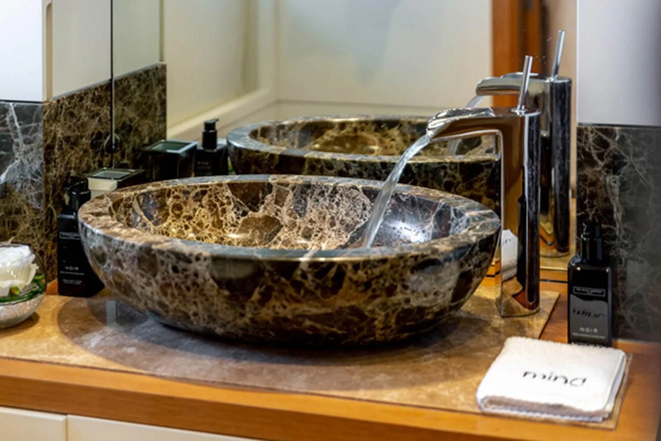 a bowl of food on a counter aboard MINA Yacht for Sale