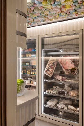 a refrigerator with food inside aboard OCEANBIRD Yacht for Sale