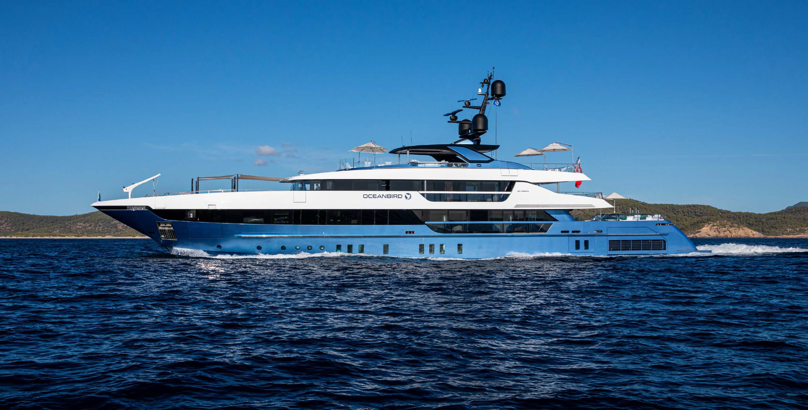 a large white boat in the water aboard OCEANBIRD Yacht for Sale
